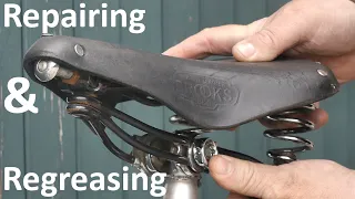 Repairing and re-greasing a Brooks B66 leather bicycle  saddle