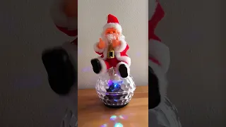 Chinafake animated santa Claus on a disco ball