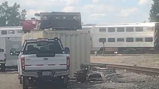 A Light Blue Outbound Metra Train going fast passing the Spaulding Junction, IL. 6/9/22.