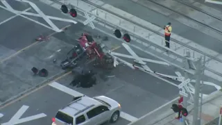 SunRail train strikes semi in Orange County, closing road, delaying commuter rail