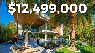 Inside this $12,499,000 Luxury Florida Waterfront Mansion with VIRTUAL GOLF!