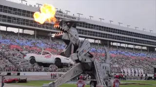 Robosaurus destroys a car at TMS