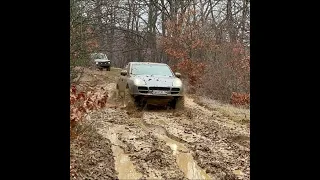 Porsche Cayenne 4.5s on 35 inch tires Off road in mud