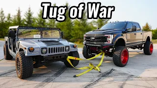 Tug of War: Military Hummer vs. F-350 Sema Truck
