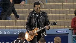 SF@LAD: Rock guitarist Slash plays the anthem