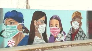 Oliver Gris realiza mural en apoyo a comunidad médica en Cancún