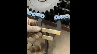 Bicycle  chain attached .see how it is difficult to do without machine