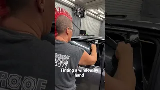 Tinting a window in 60 seconds by hand tools