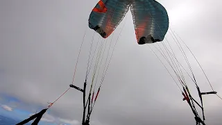 Paraglider collapse over Dachstein, Austria - how to make Skywalk Paragliders logo with a paraglider