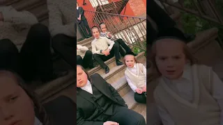 Spanish-speaking man approaches Hasidic kids