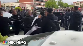 Protests over Pride Month at California school board meeting turn violent