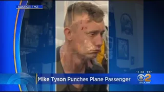 Video shows Mike Tyson punching man on plane