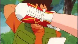 Misty kicks Brock in the face