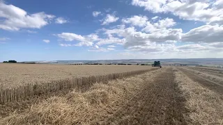 John deere 1075 bringing in the harvest