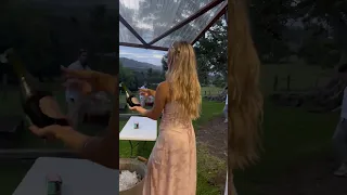 Birthday girl fails at pouring champagne tower