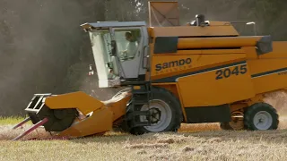 A farmer rocking a combine harvester in Central Finland