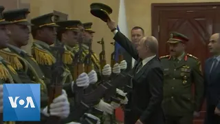 Putin Replaces Dropped Cap of Palestinian Honor Guard