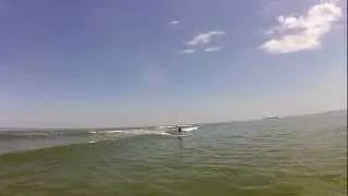 Tanker Surfing Small Wave on Galveston Bay