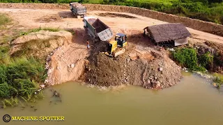 Good Job Bulldozer CAT & Dump truck Starting New Project On Pushing And Spread The Land Into Pond
