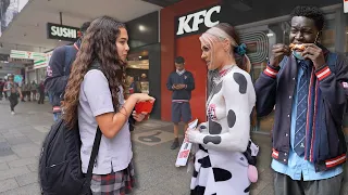 Teens Eat KFC in Front of Topless Vegan