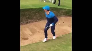 Rory McIlroy takes 6 to get out of a greenside bunker at the "postage stamp".