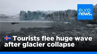 Watch: Tourists flee large wave after Icelandic glacier collapse