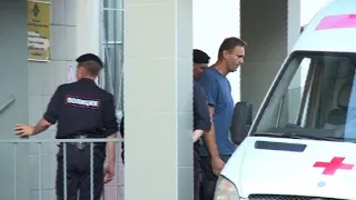 Alexei Navalny leaves Moscow police station after being detained