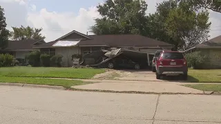 Garbage Truck Crashes Into Woman's Home