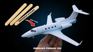 hard work making a plane from wooden sticks | Embraer phenom 300