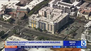 Suspect barricaded inside WeHo apartment building after allegedly shooting neighbor through wall