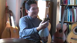 lutes and early guitars. Taro Takeuchi