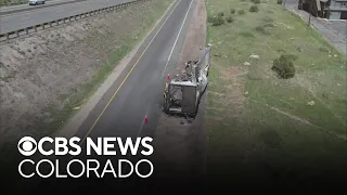 Colorado investigators check into delayed removal of burned-out trailer on side of Interstate 70