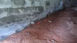 Water Leaks into Block Wall Foundation