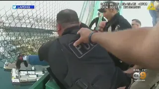 Body Camera Video Shows Authorities Pull Woman To Safety From Long Beach Bridge