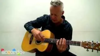 Tommy Emmanuel teaches how to play harmonics on the guitar