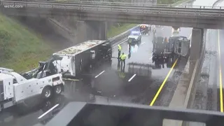 Tractor trailer flipped on its side on I-85 at Lowell exit