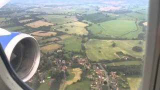 Window view of plane Landing at Birmingham Airport