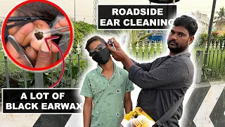 Ear Cleaning a Kid On The Indian Roadside! Big pieces of black earwax! asmr ear cleaning Vijayawada