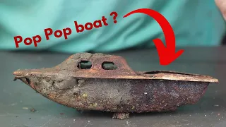 Pop Pop boat restoration ( found in river )