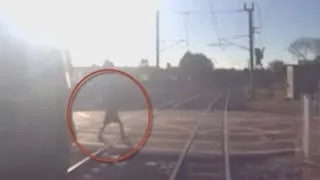 CCTV FOOTAGE: Train Near-Miss As Man Cheats Death