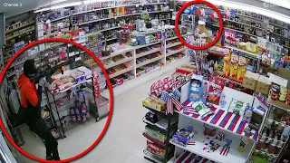 Elderly store owner shoots robber armed with rifle, video shows