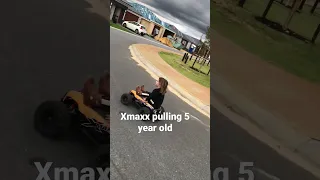 Xmaxx 8s can it pull a 5 year old ? #xmaxx #traxxas