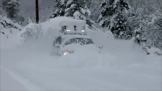 Nissan Armada 4x4 snow play in mountain road. Short version.