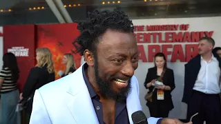 THE MINISTRY OF UNGENTLEMANLY WARFARE: Babs Olusanmokun red carpet interview | ScreenSlam