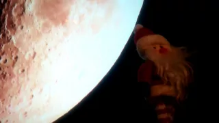 Santa flying across the moon
