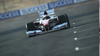 Formula One race car on desert circuit  footage 2652581