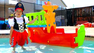 Jannie & Andrew Pretend Play with Toy Pirate Ships in the Pool for Kids