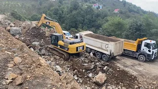 Caterpillar excavator working on road construction