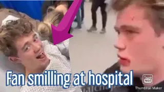 Chelsea fan laughs in hospital bed after being knocked out by  West Ham fan !!!