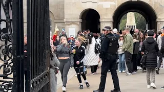 ARMED OFFICER SHUTS UP THE SCREAMING GIRLS THE KING’S GUARDS